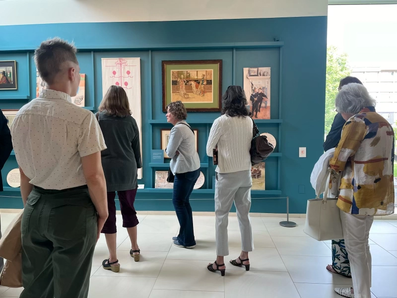 Visitors explore artworks and Capption-enabled labels at the American Swedish Institute