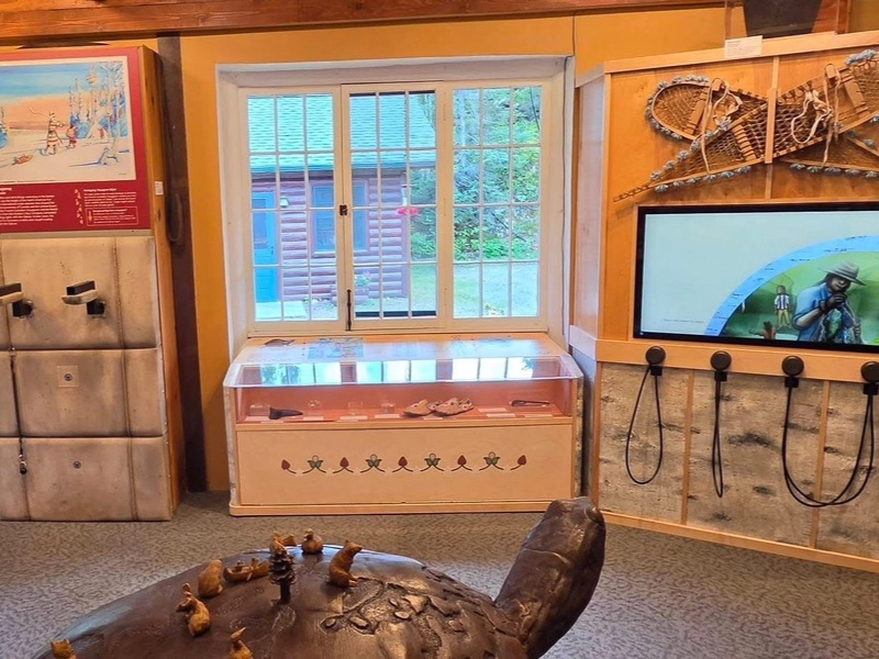Interactive displays, artifacts, and snowshoes in the Zagaandagaa-Anishinaabeg exhibit